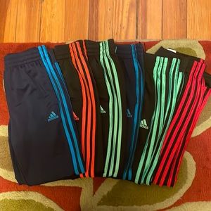6 pairs of Adidas track pants with banded ankle.